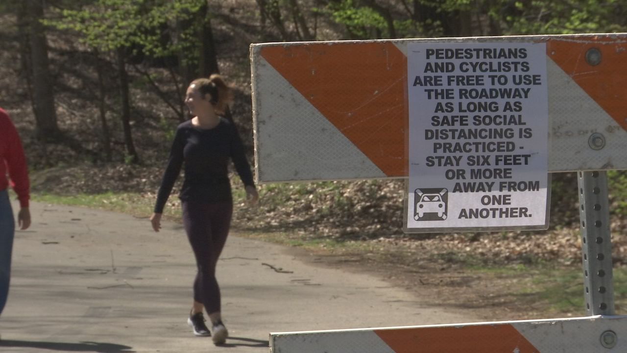 Road closed sign at Louisville park due to COVID-19
